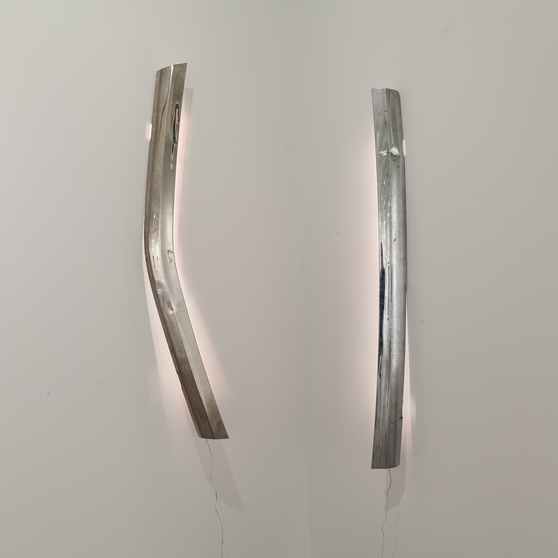  Tracy Treadwell (Memphis, TN)   It's a Dream in Here , 2018  Medium: Chrome bumpers and LED Lights  Dimensions: 66x58x5 inches each 
