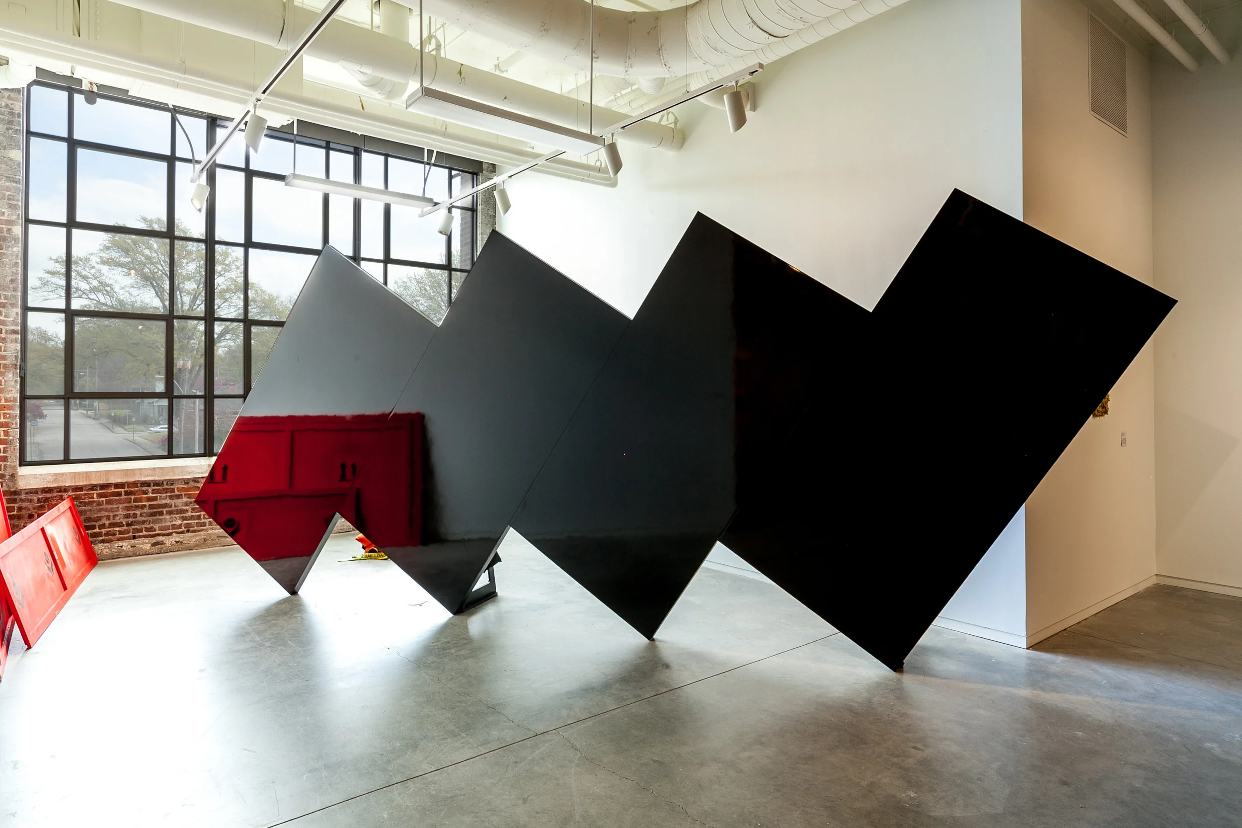 Marcus Manganni (Brooklyn, NY) A Kyte to Caesar , 2019 Medium: Refurbished plywood, laminate, and acrylic Dimensions: 16x9x2 feet “A viewing point that breaks its environment into double imagery and color. A pause.” – Marcus Manganni