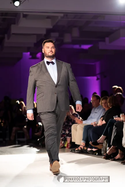 Brandon Brown wearing Eric Adler Clothing