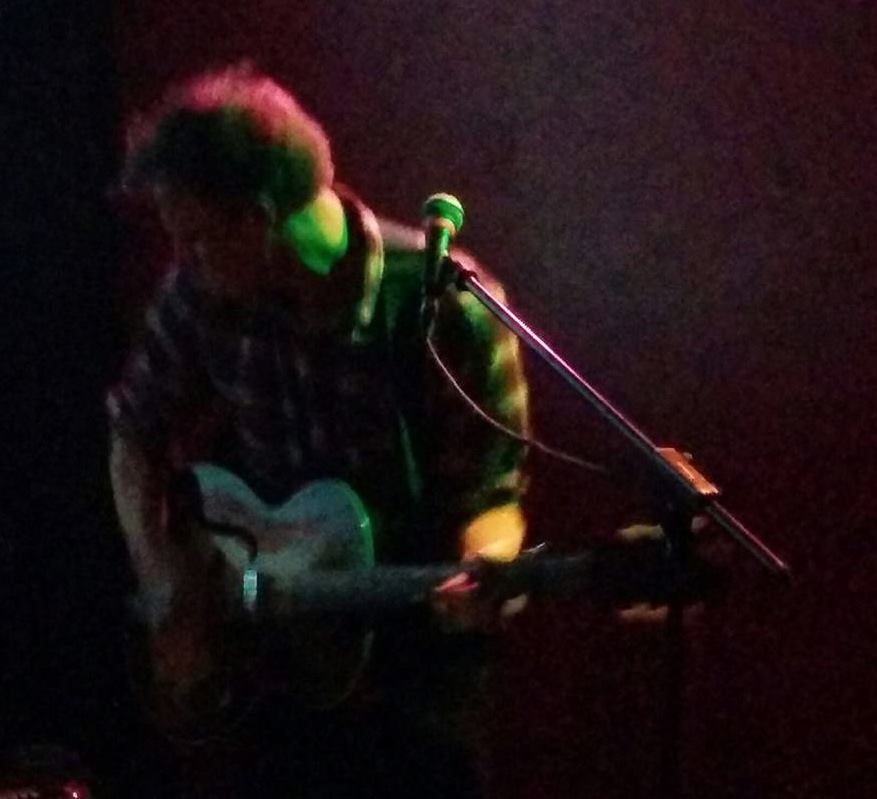 Tony blurred rocking out.jpg