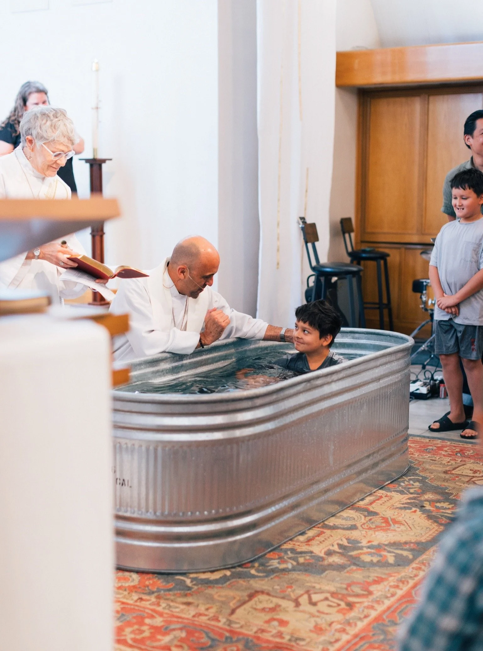 "We thank you, Father, for the water of Baptism. In it we are buried with Christ in his death. By it we share in his resurrection. Through it we are made regenerate by the Holy Spirit. Therefore in joyful obedience to your Son, we bring into his