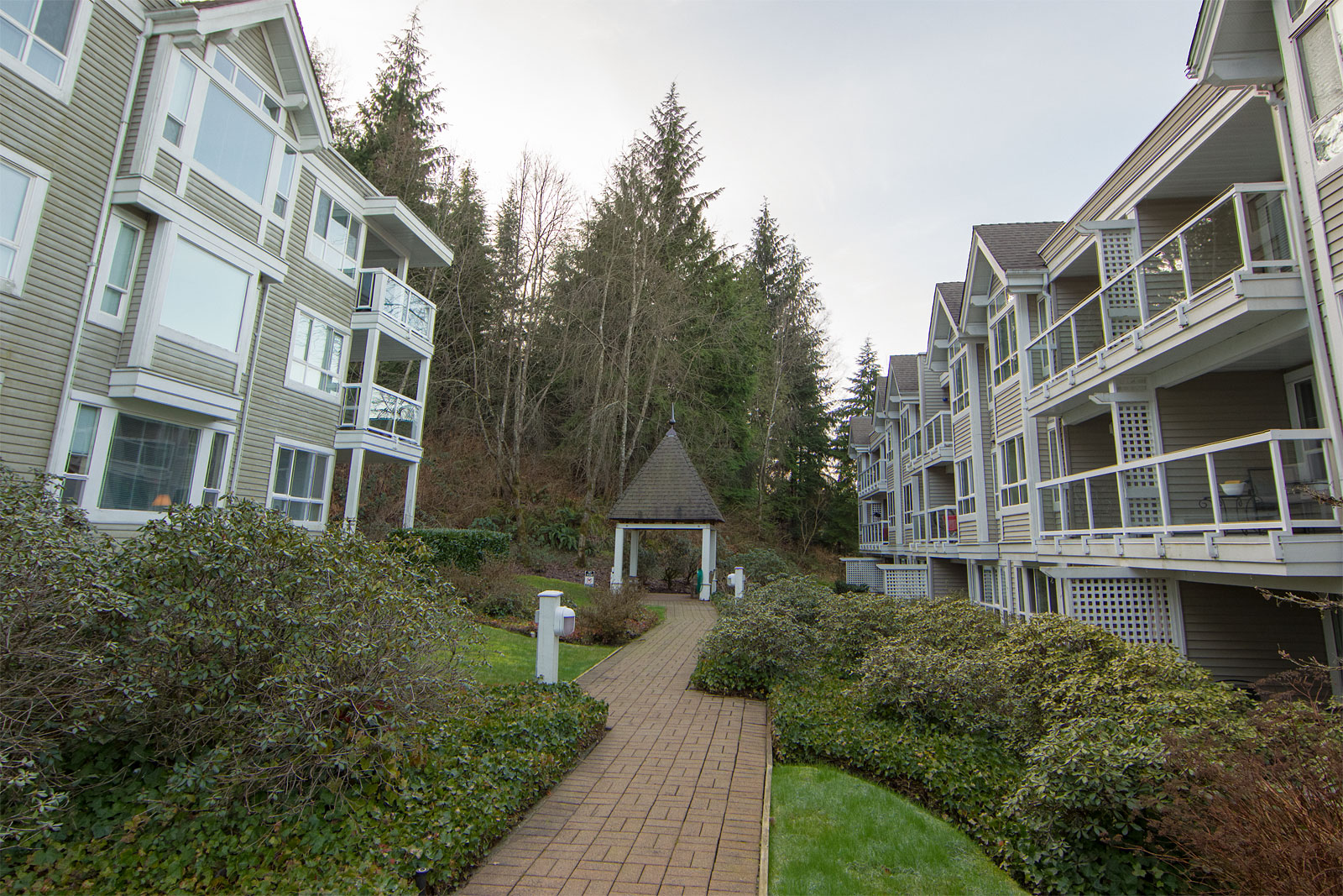 Outside of the Glenmore - 3099 Terravista Pl. on the left, 3033 Terravista Pl. on the right. Only about 30% of the condos in this complex face outward toward the mountains. As suite 312 is about half way down the complex and on the top floor of 3033, it has one of the best, if not the best, views in Glenmore and is a much preferred suite to nearly all other units in this complex.