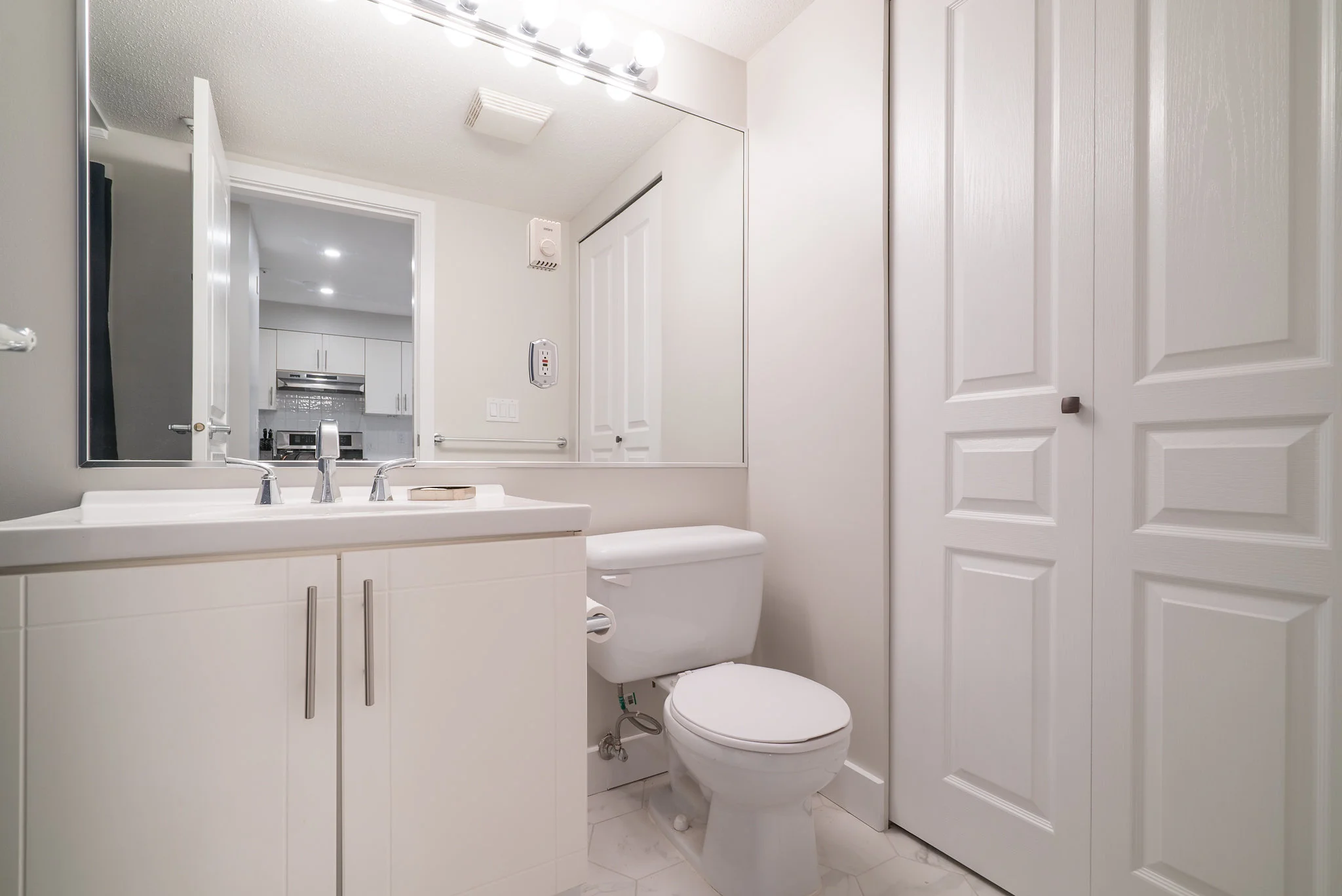 Bathroom & Storage Closet (Storage Closet Includes Washer & Dryer)