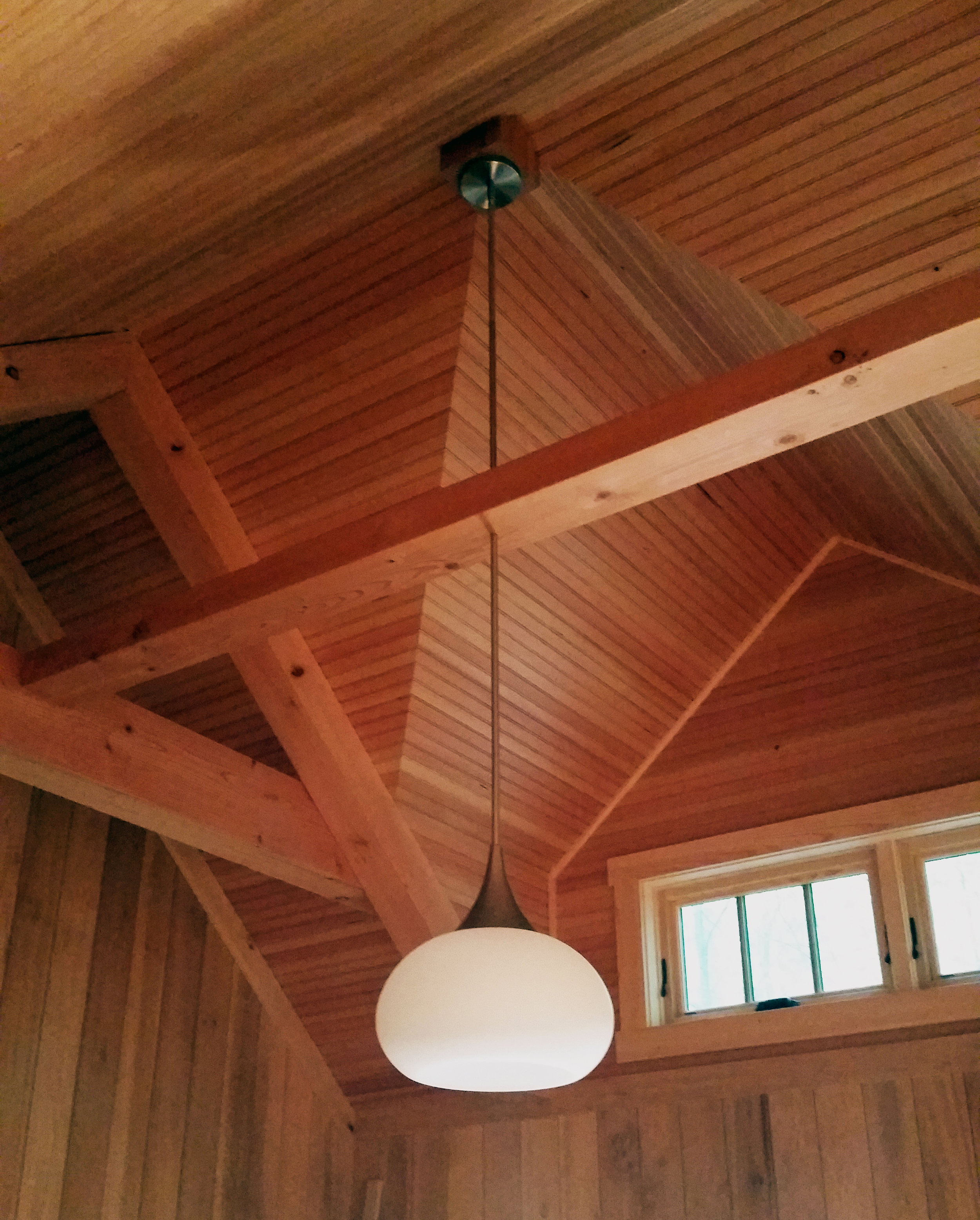 Finished ceiling and lighting in guest bedroom
