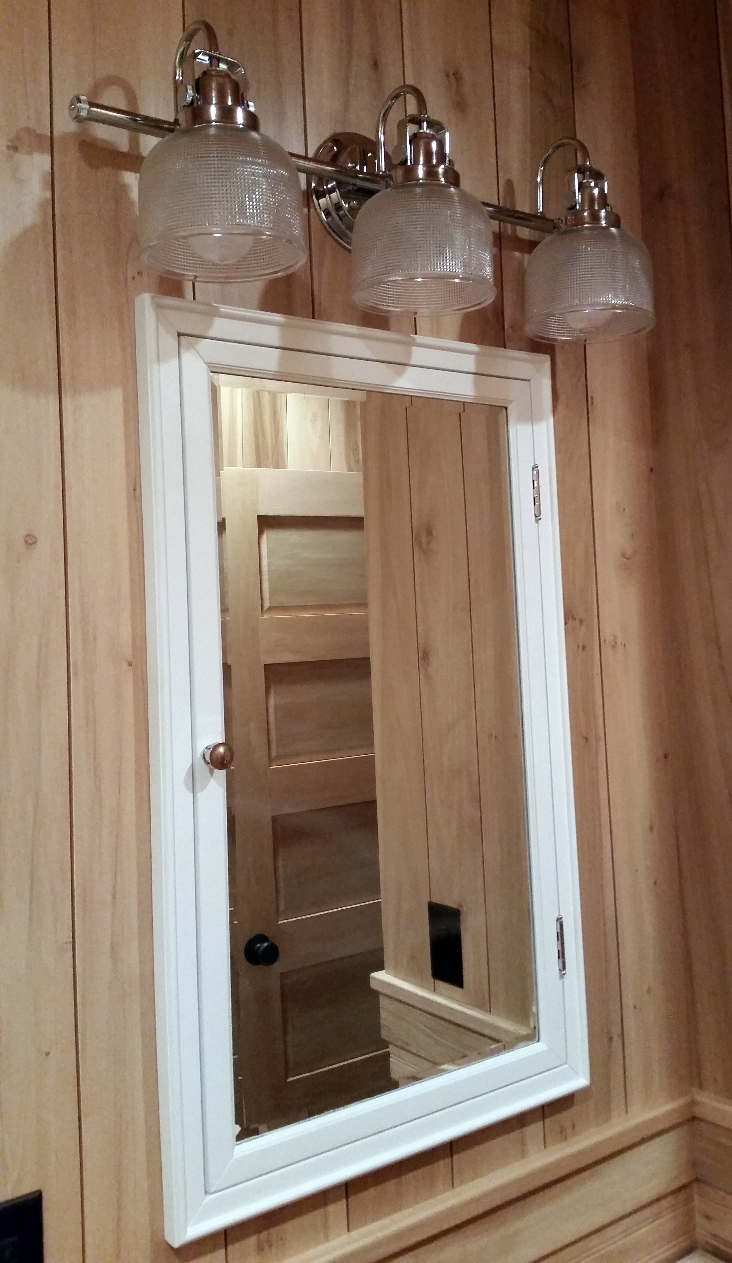 New medicine cabinet and bathroom lighting