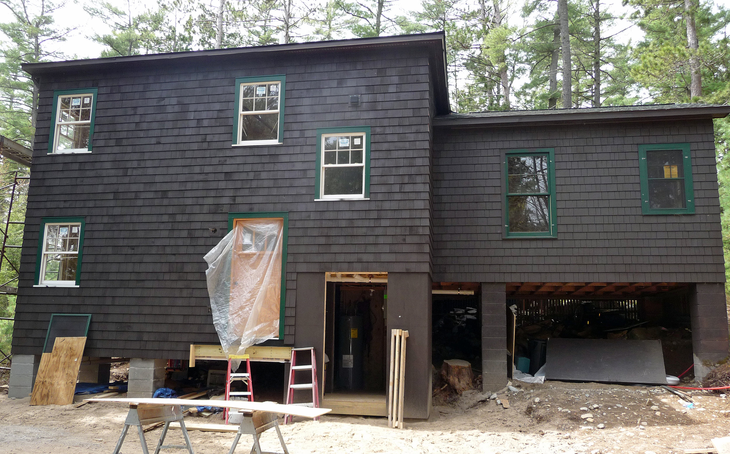 Exterior shingle siding painted and installed