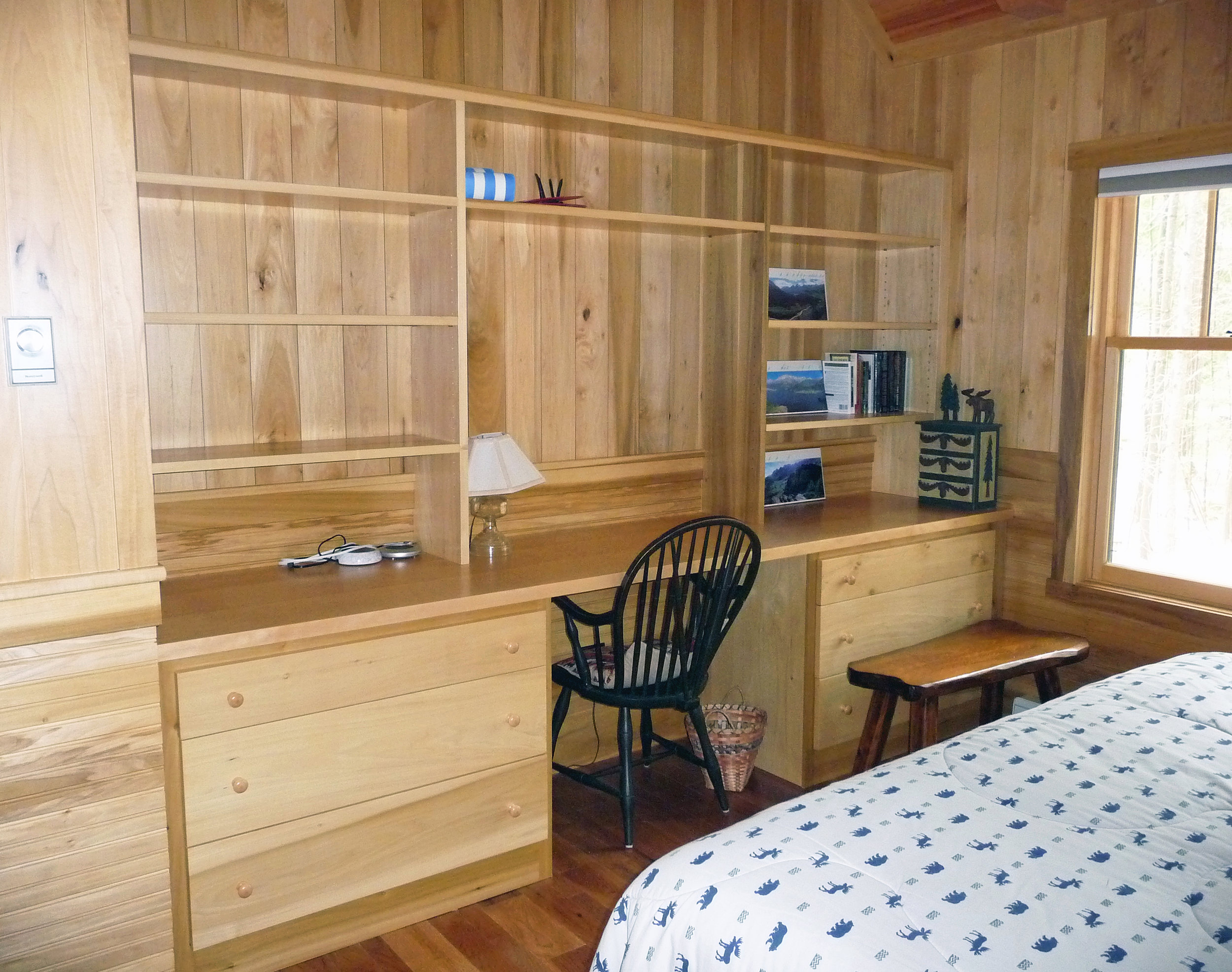 Custom designed poplar built-in dresser, desk, and shelving