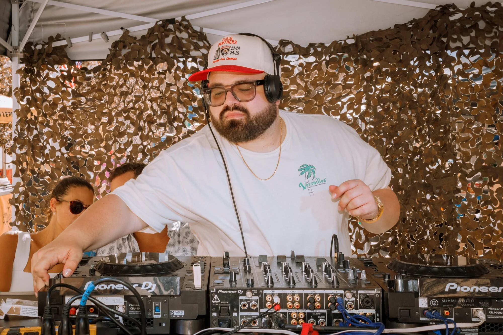 DJ spinning at the Over Under block party