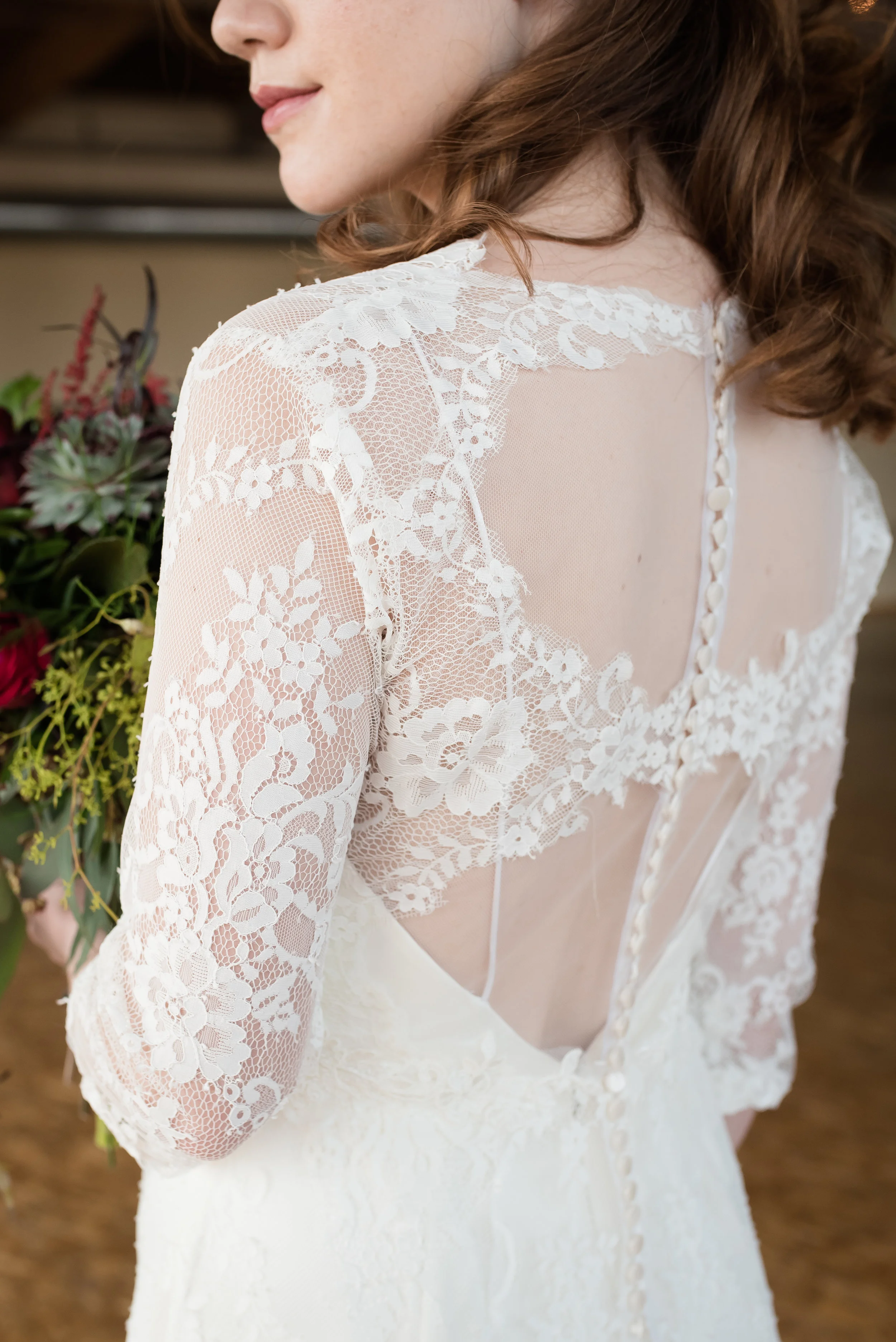 Mignonette Bridal supplied the dresses. This was was so cool - it has a satin finish (you'll see later) and also a lace sheath to wear over the top. 