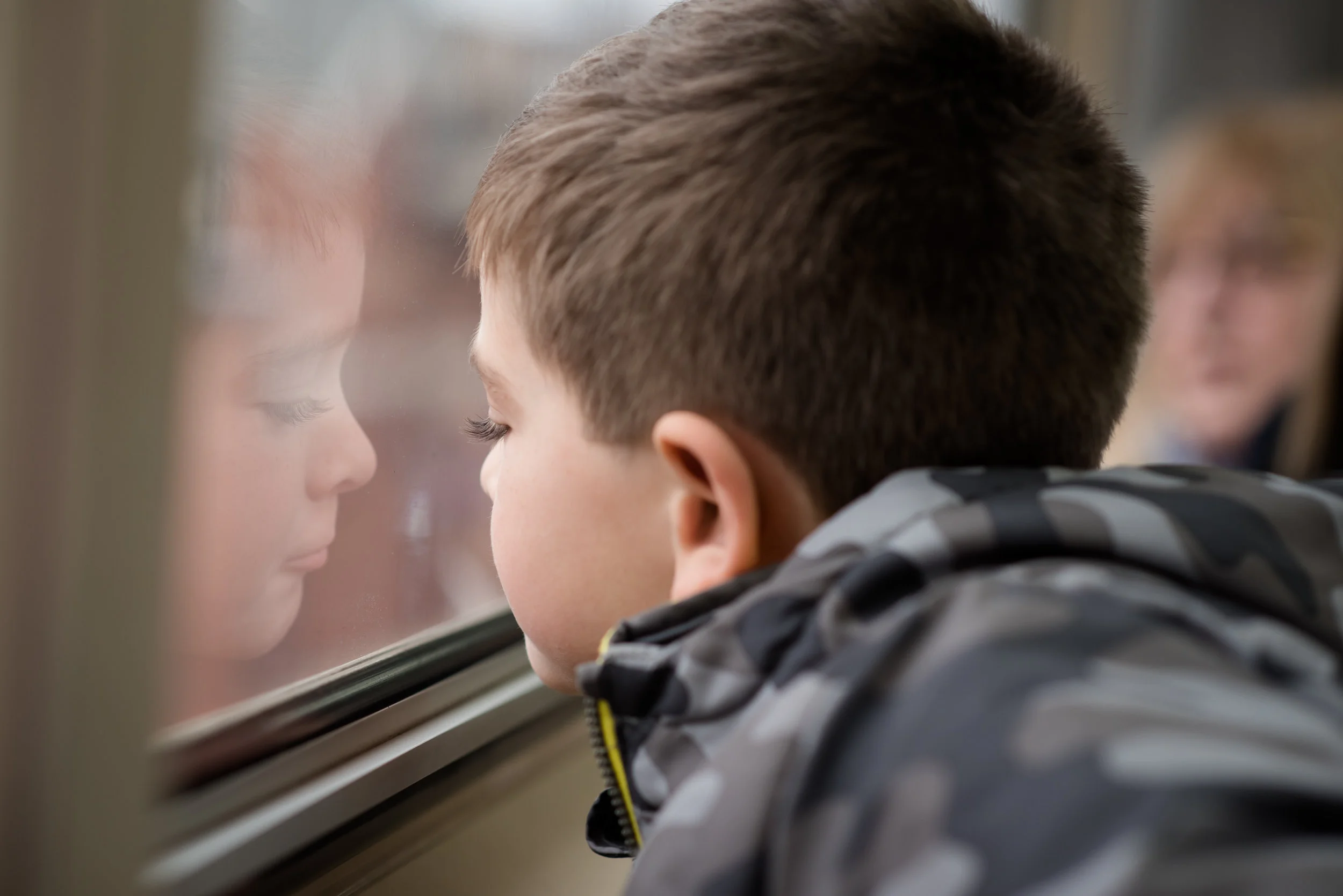 Carl looking out the train window.