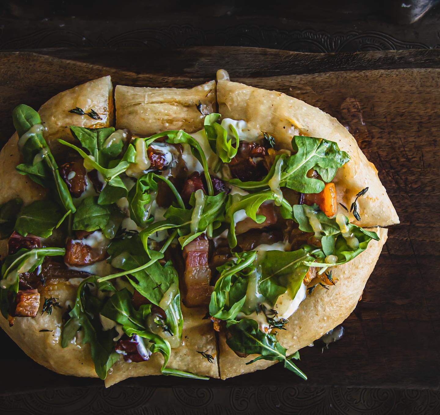 Little room this eve to come check out our new fall menu! 
.
Reservations available and walk in&rsquo;s always welcome.
.

Pissaladi&egrave;re
.
House made sourdough flatbread/ @irvings_farm Lardon/ @lakeside_farmstead fromage blanc/ rocket/ carameli