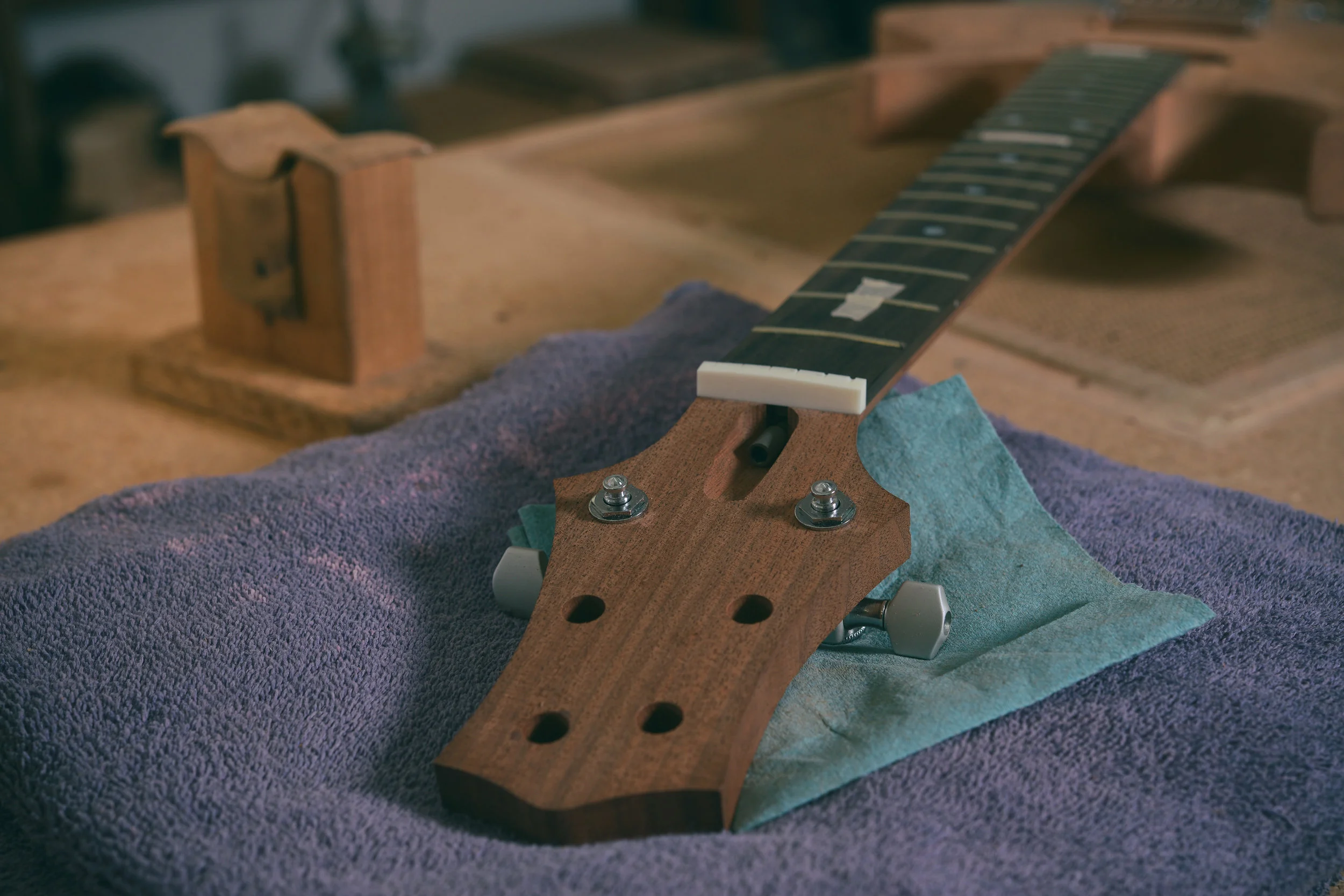 Mounting 1st and 6th string tuners for setting bridge position.
