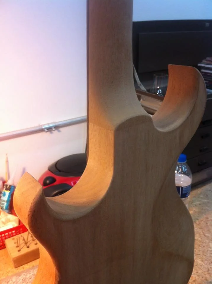 Finish sanding the neck joint after gluing.