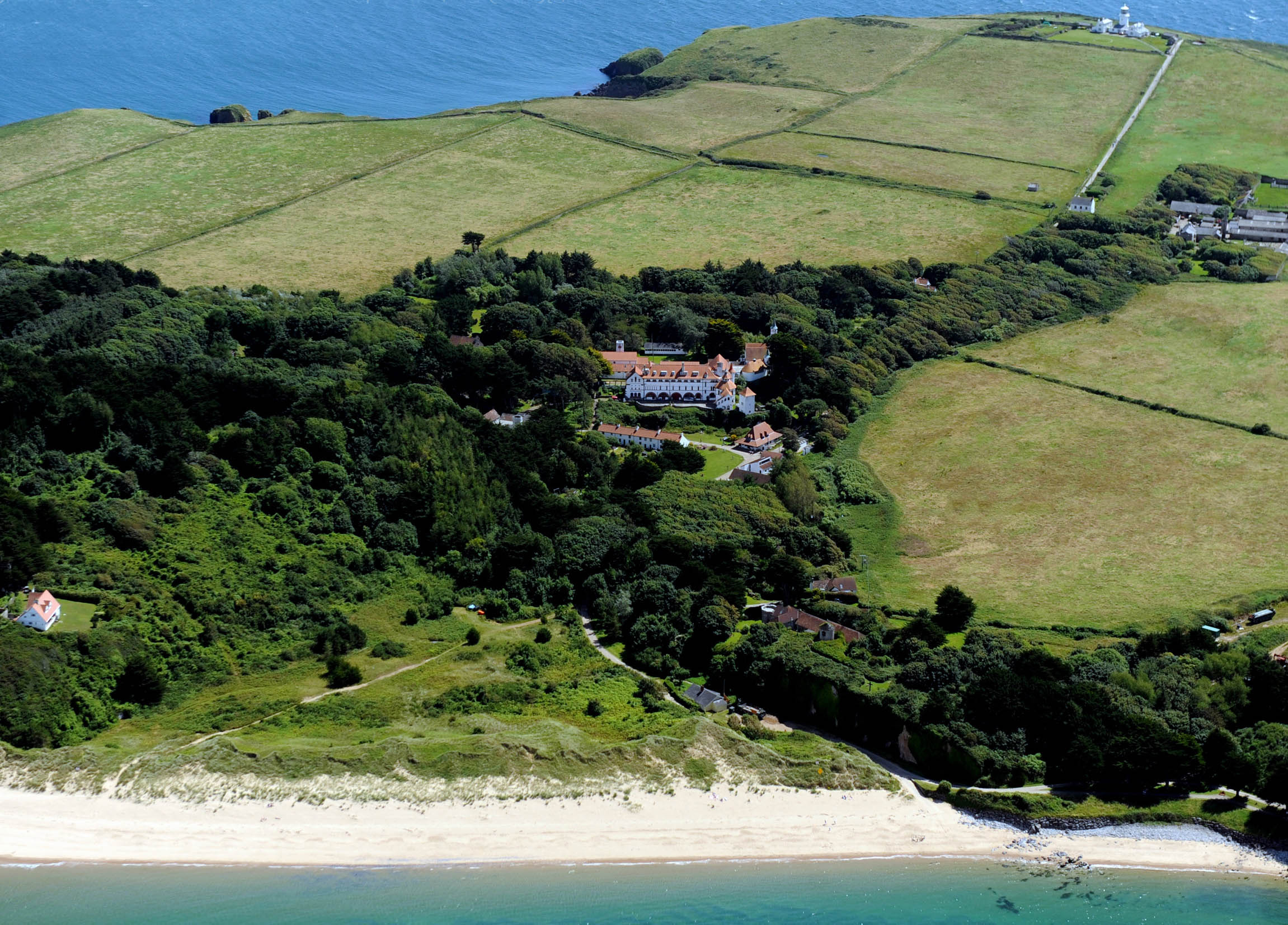 Caldey Abbey and Priory Beach from air.jpg