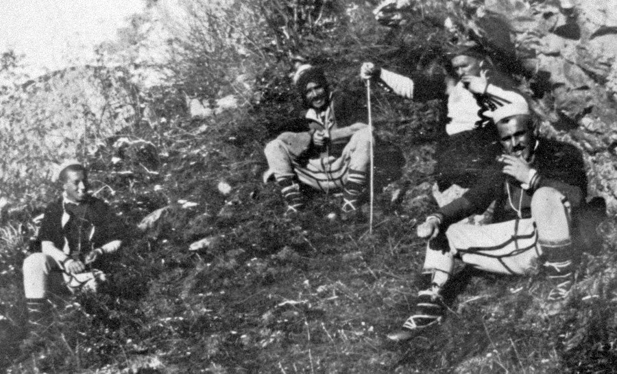 Men of Shtrirovica conversing on a hillside.