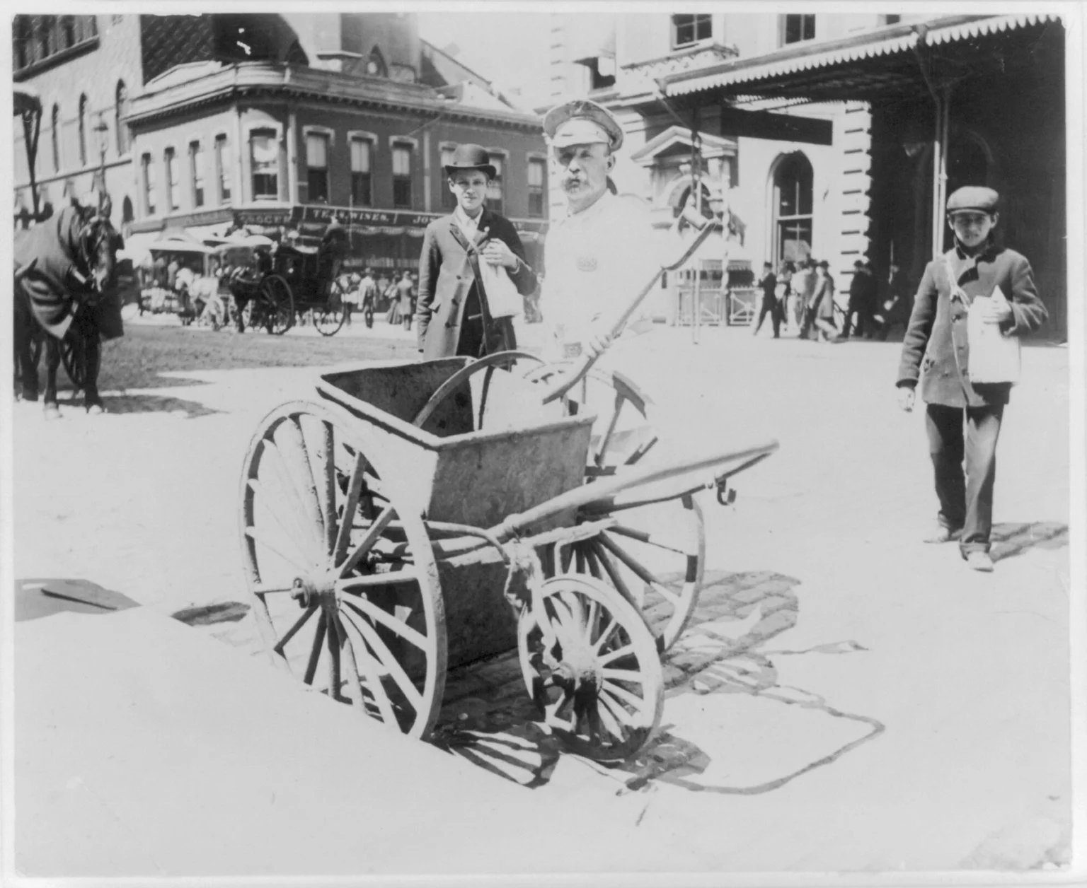 Street types of New York City: Street sweeper and handcart 