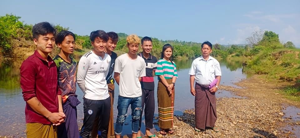 Uzziah with group of new believers to be baptized