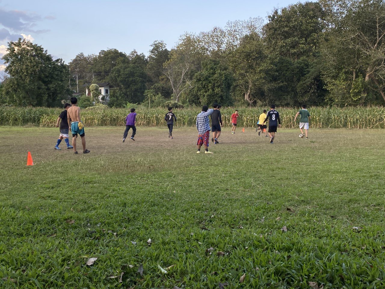 Students playing soccer after classes are done