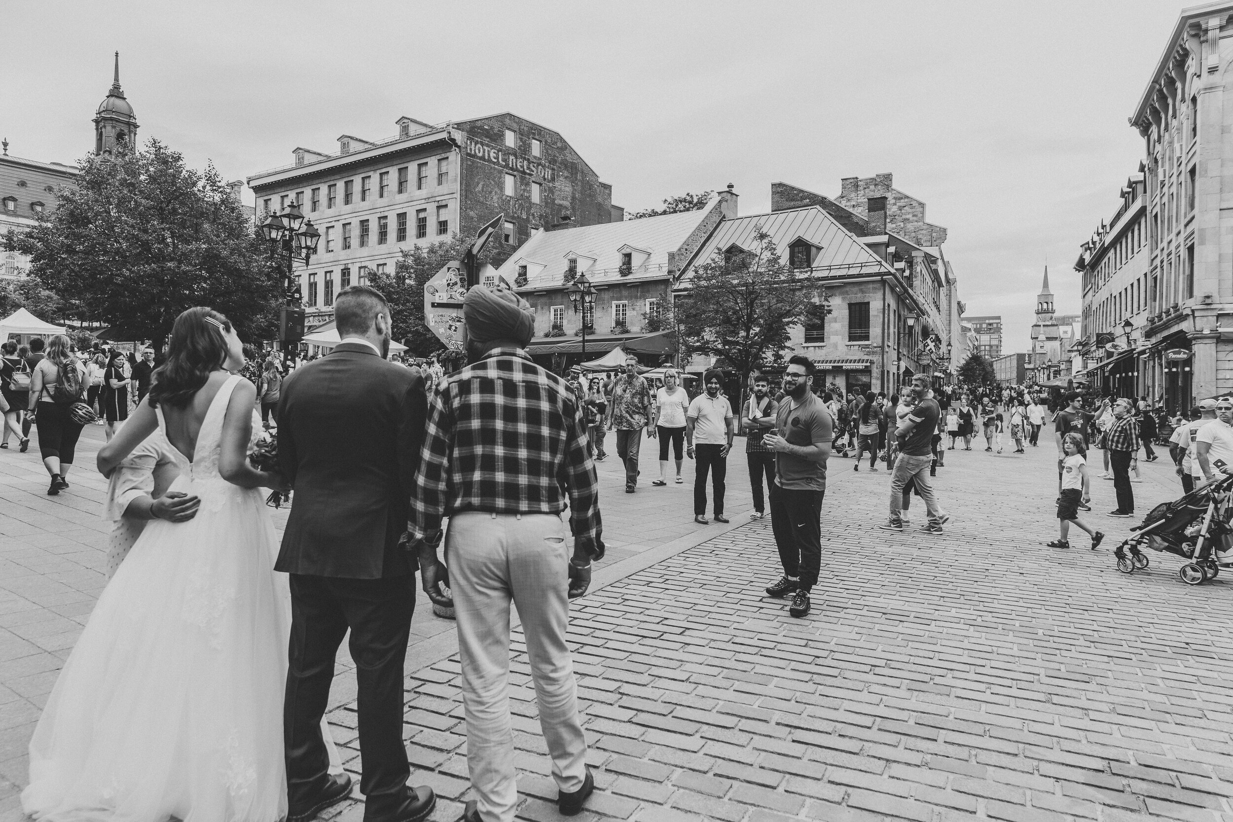 Bride and Groom pose with tourists in Old Port Vieux-Port Montreal