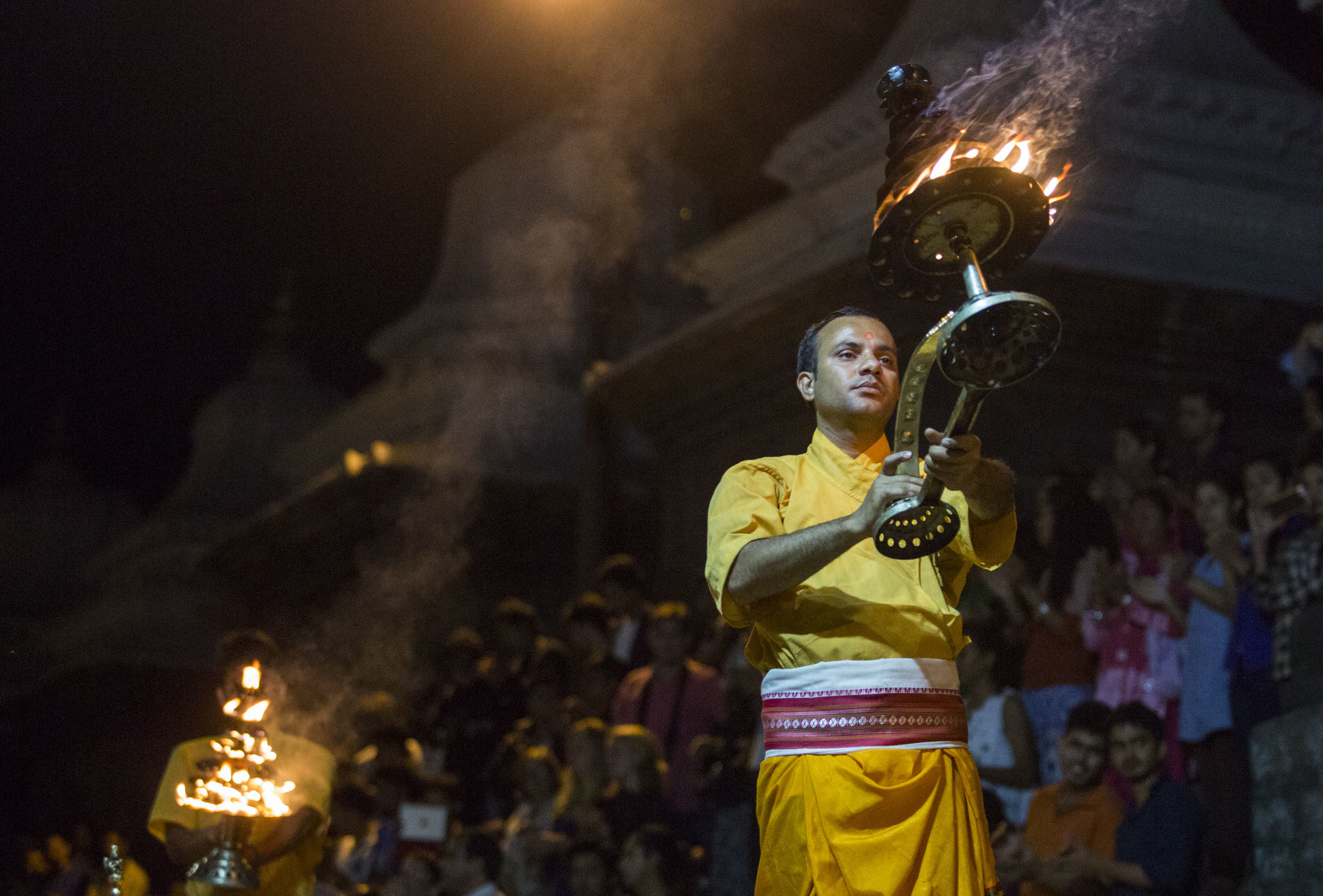  Hindu priests hold their nightly worship ceremony at Pashupati. Pashupati is home to the oldest temple in Nepal and is considered one of the most sacred places in Hinduism. 
