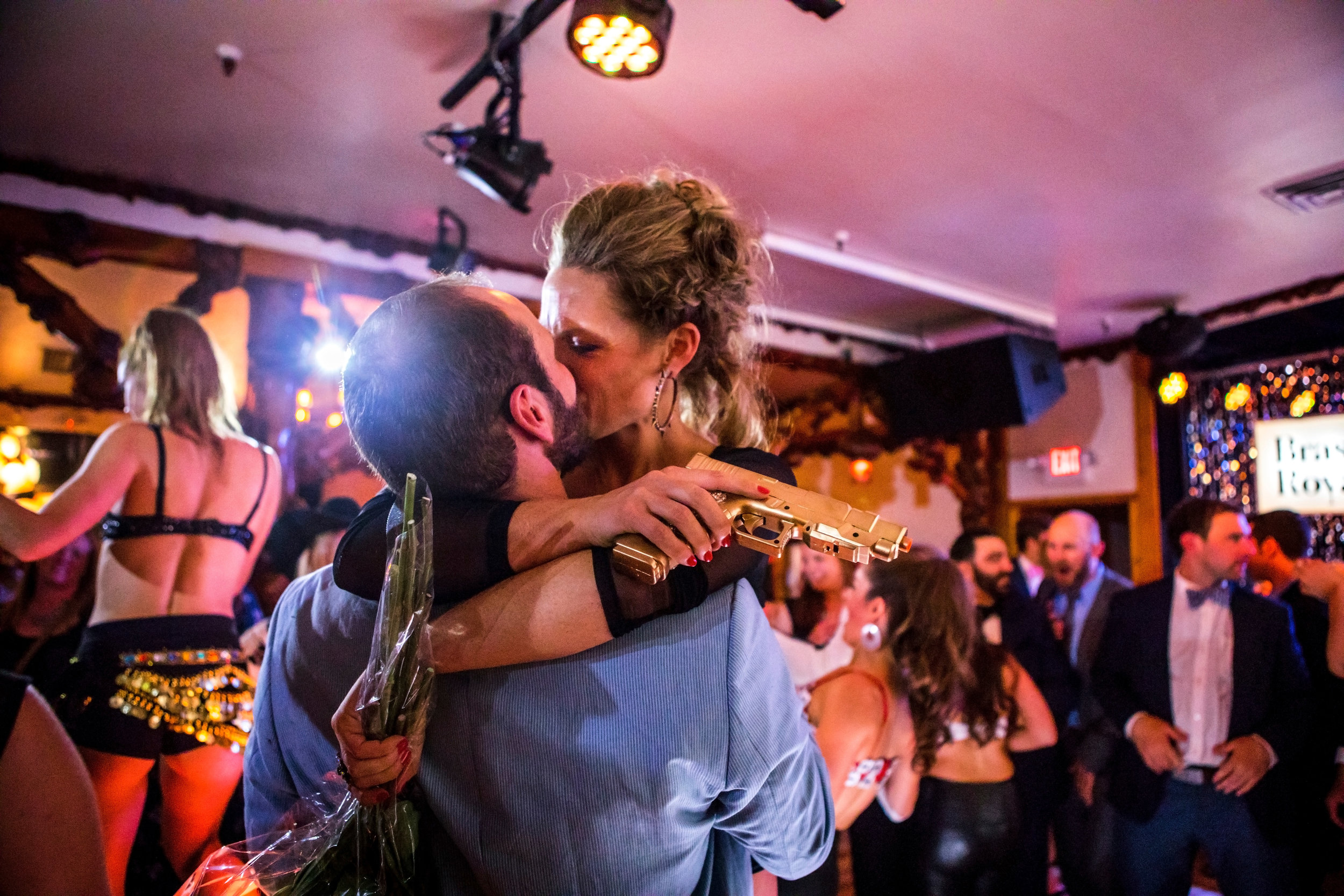  (right to left) Augusta Friendsmith kisses her fiancé Carsten Stuhr after modeling in Bras for a Cause on May 12, 2018 at the Million Dollar Cowboy Bar in Jackson, Wyo. Friendsmith designed and modeled the ensemble with the highest bid, a record bre