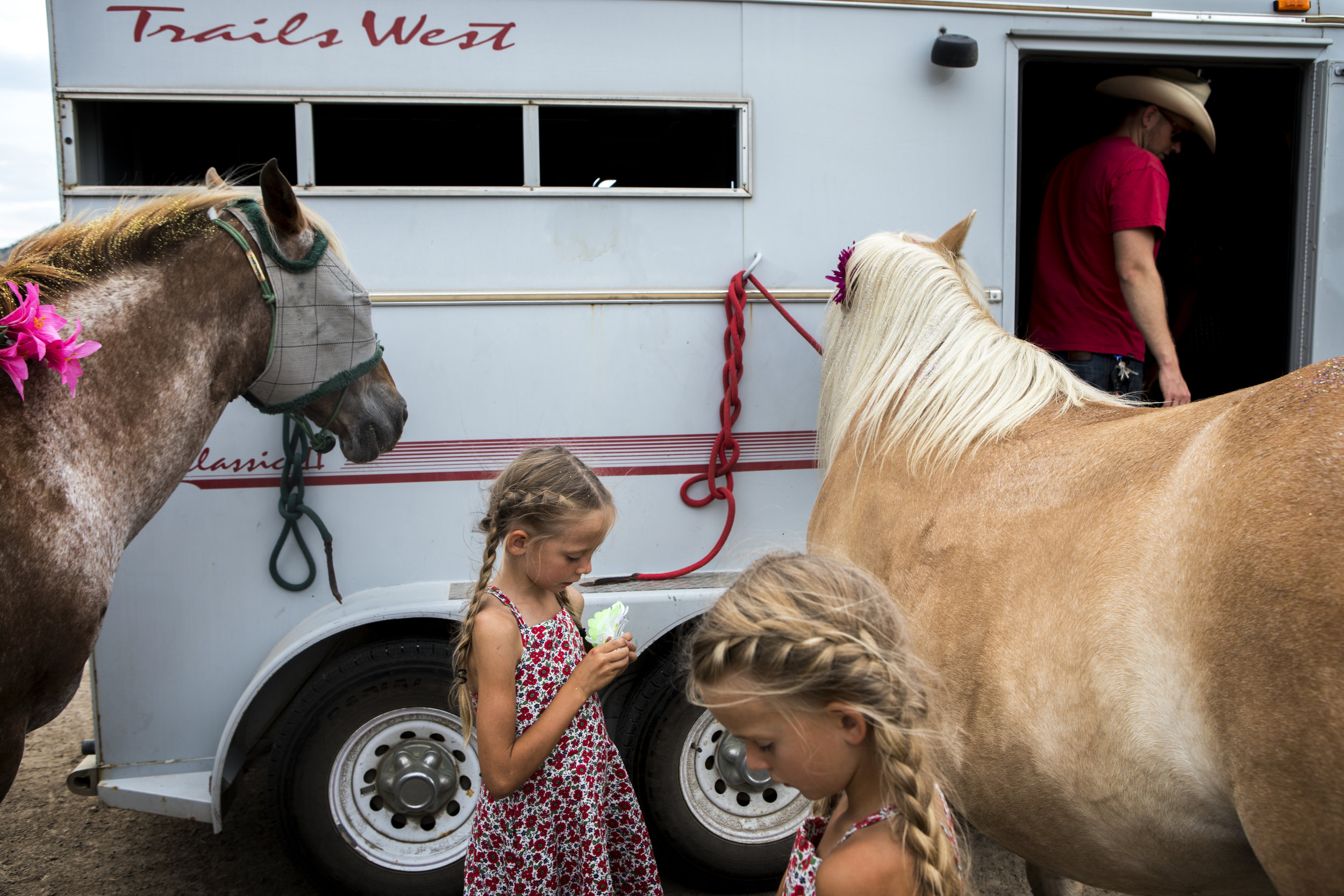  Sisters Helen, 6, and Harper Bextel, 7, prepare horses for fun night at the Teton County Fair on July 22, 2018 at the Heritage Arena in Jackson, Wyo. 