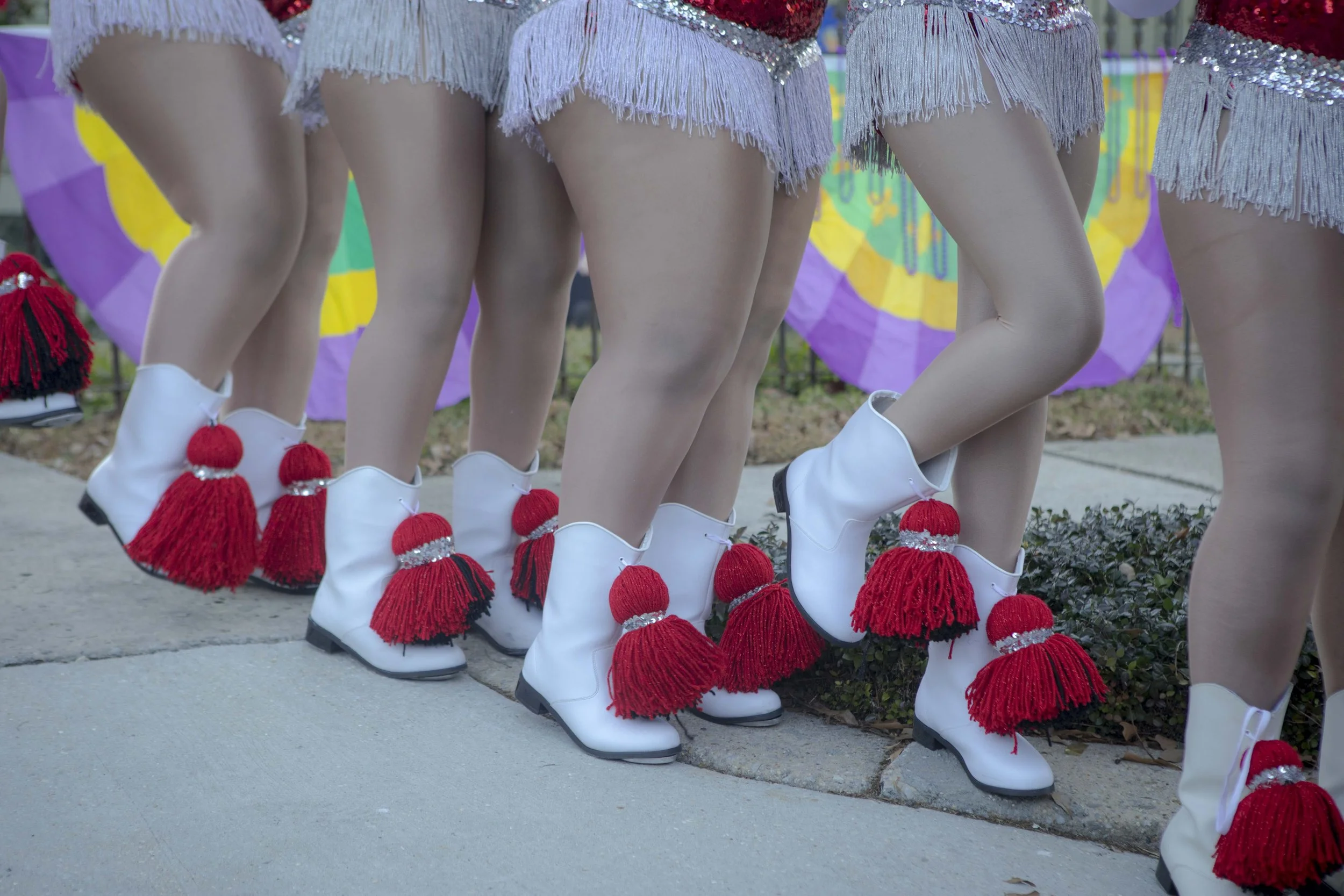  The Langston Hughes Academy baton team lines up before the Spartan Society parade during Mardi Gras in New Orleans, La. on Feb. 7, 2026. The girls march in tap shoes approximately 4.5 miles for the parade. 