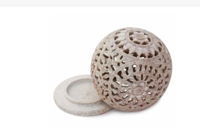 IVORY CIRCULAR SOAPSTONE COVERED TEALIGHT CANDLE HOLDER