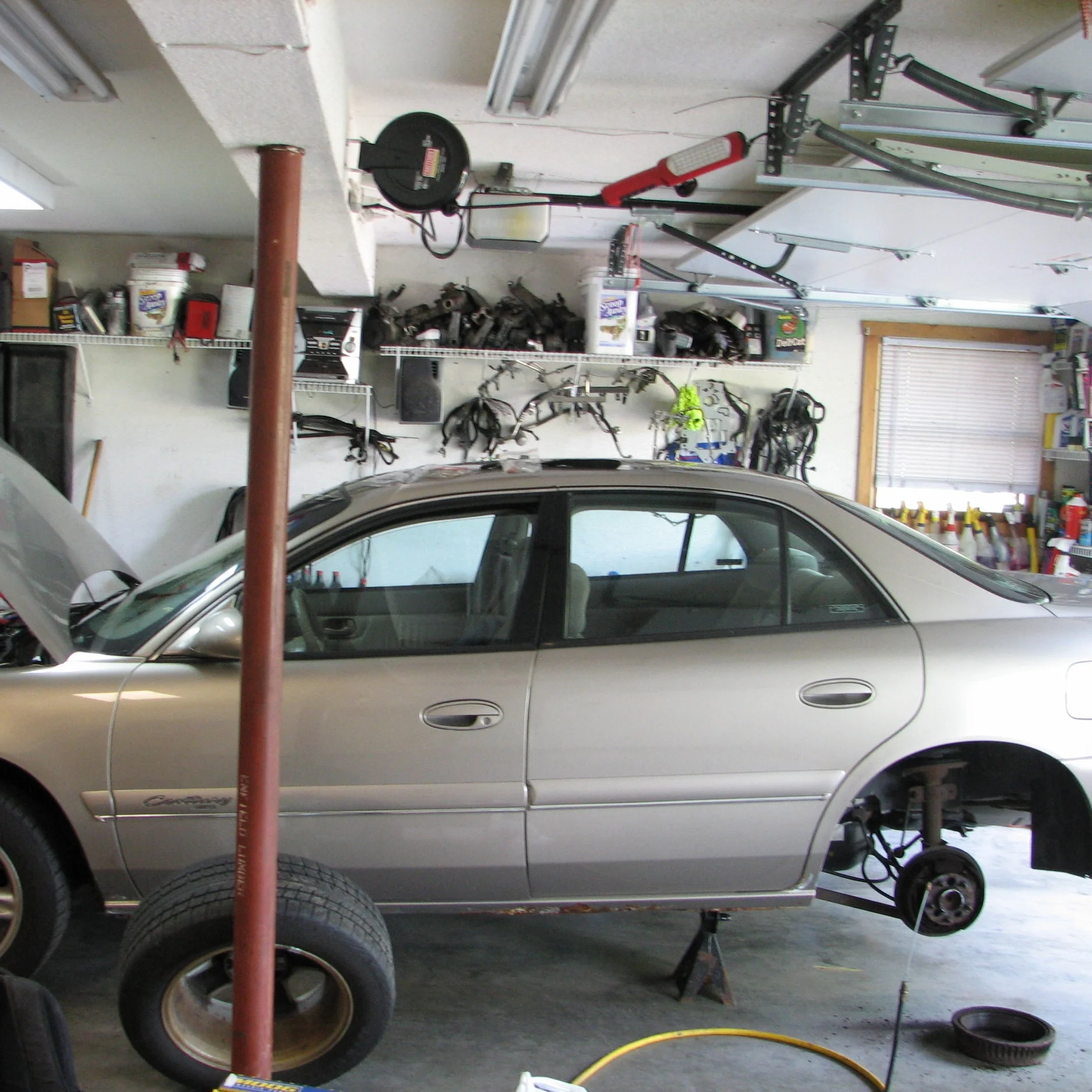 Car maintenance in a friends garage.