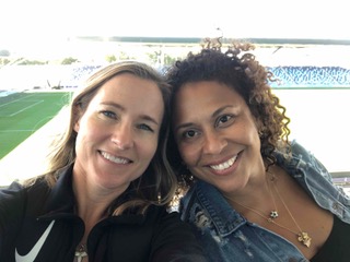  Kely and I at the Manchester City women’s stadium, a footbridge connects to the men’s stadium. 