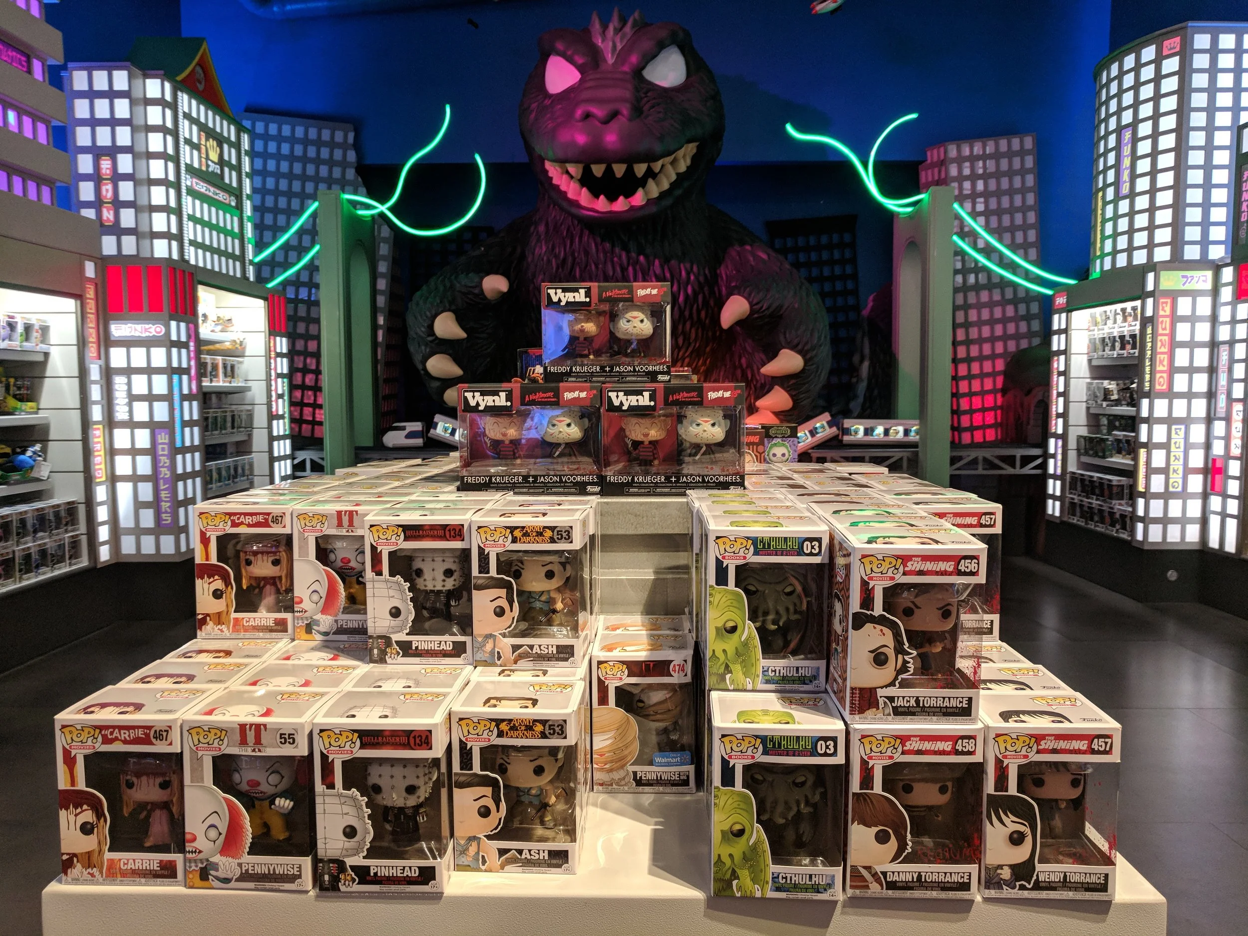 I love the way he's lurking over the horror figures!