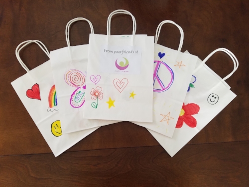 Dignity Bags that have been decorated by children