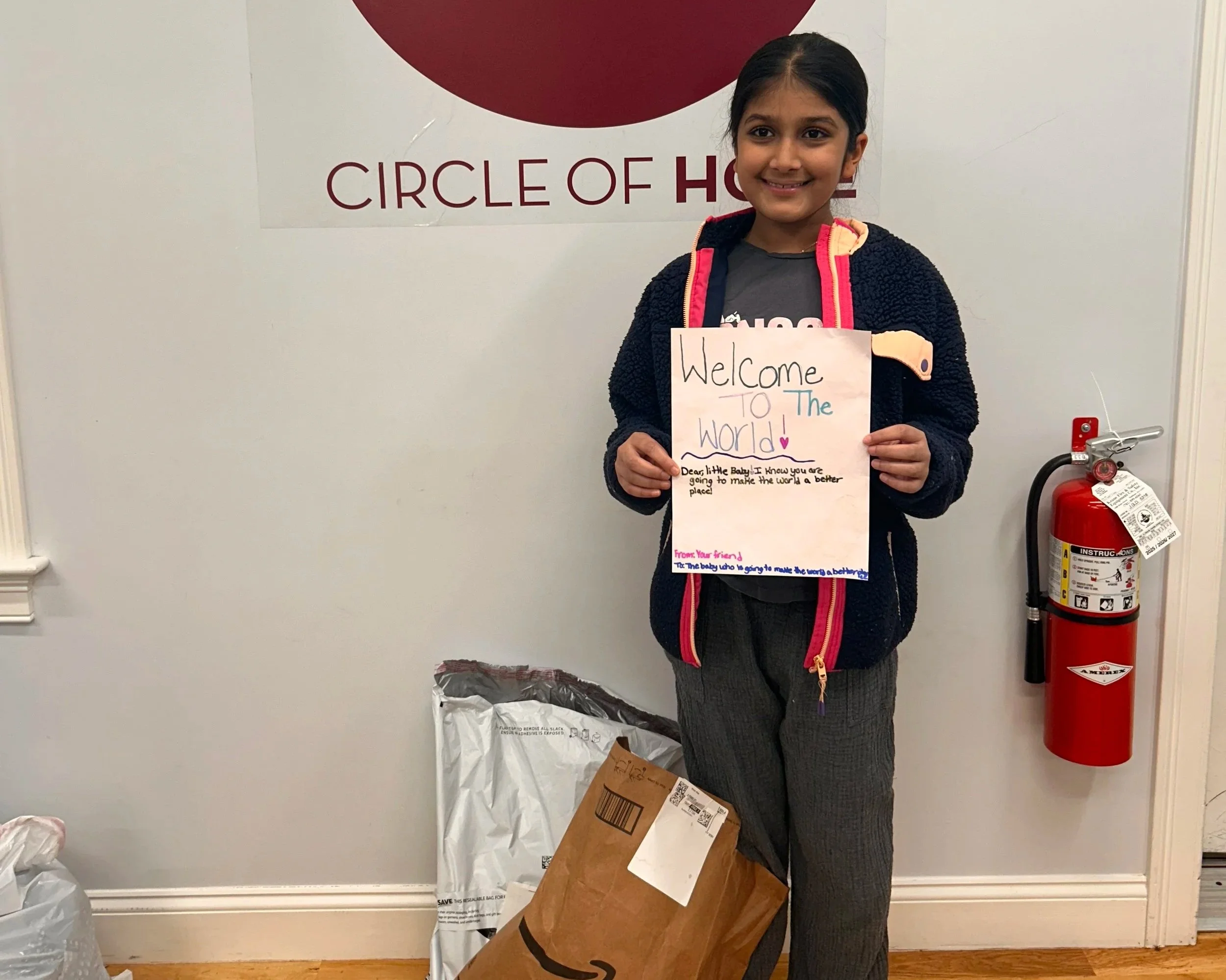  For her 9th birthday party, instead of presents,  Myra  collected items for a Welcome Baby Bag, and included a handmade note to a new baby.&nbsp; 