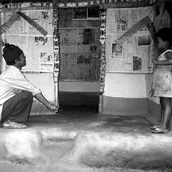 Decorating the huts together. We think that children born in the camps will help us in the future to return to our country. They do not know about Bhutan but we elder ones have to teach them about the Bhutanese situation. Bhimma / PhotoVoice / LWF