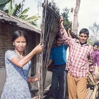 We are refugees so our homes are made of mud and plastic. My brothers are repairing our house. Though we are refugee we are satisfied and we make the house as nice as possible. Dilu / PhotoVoice / LWF