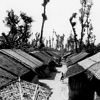 Refugee huts are arranged in lines and made out of bamboo and plastic. I have spent 8 years of my life living here and I do not know how many more it will be. We are becoming adults but have only distant dreams of our country. Pasang / PhotoVoice / LWF