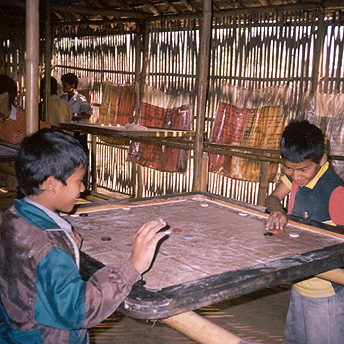   Karim is a popular game in the camps    Purna   / PhotoVoice / LWF  