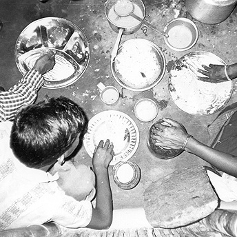  Supper in my hut. We all eat happily together in our small huts even though we are refugees. What can we do? It is difficult to solve our problems. So many years have passed and there has been no progress to solve our situation .&nbsp;  Yethi Raj / 