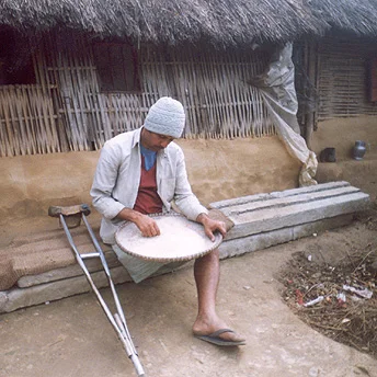 We have to work to prepare the rice we are given in rations for eating. The rice can be very dirty. It contains germs and small pieces of stone which are harmful to our health. All of these must be taken out before we can eat the rice. Bhimma / PhotoVoice / LWF