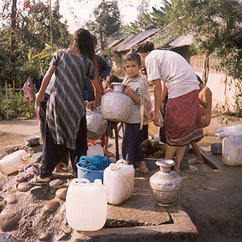   We only get water at certain times of the day. We leave the containers in a line at the tap. If we do not have enough containers there will not be enough water to do all the washing and to take baths.Khina / PhotoVoice / LWF  