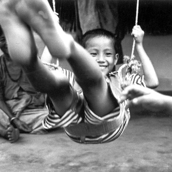  Playing happily on a swing.&nbsp; Here I am a refugee but I do not want refuge.&nbsp; I want the wings to fly.&nbsp;&nbsp; Aite Maya / Devi  / PhotoVoice / LWF  