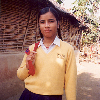 A Bhutanese girl on her way to school. Students at campus level do not have enough money for their higher studies. They collect money and buy books in a group in order to get a good result. One reads and the other can explain and share their ideas with the other. Indra / PhotoVoice / LWF