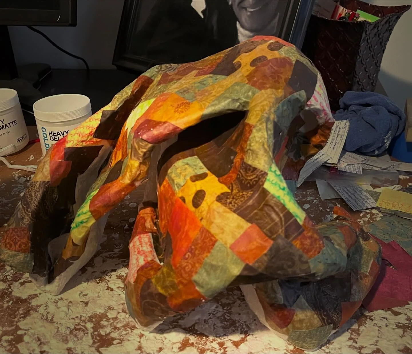 A new sculpture I am working on. It is made up of window screen, joint compound, modeling paste, old paper samples, discarded journal pages and matte medium. I will update when finished but it will probably contain words and symbols conveying things 