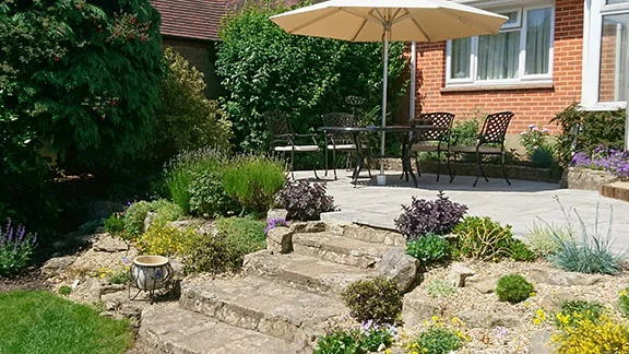 Rockery rebuilt with stone found on site.