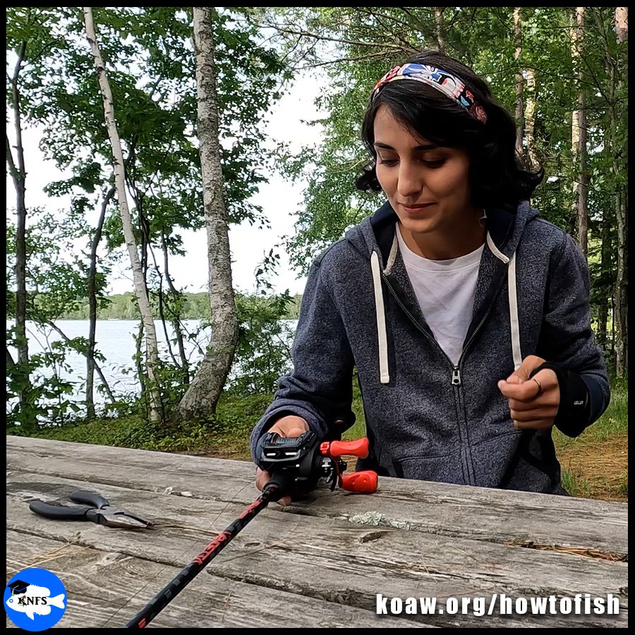 An angler with her very first rod and reel combo.