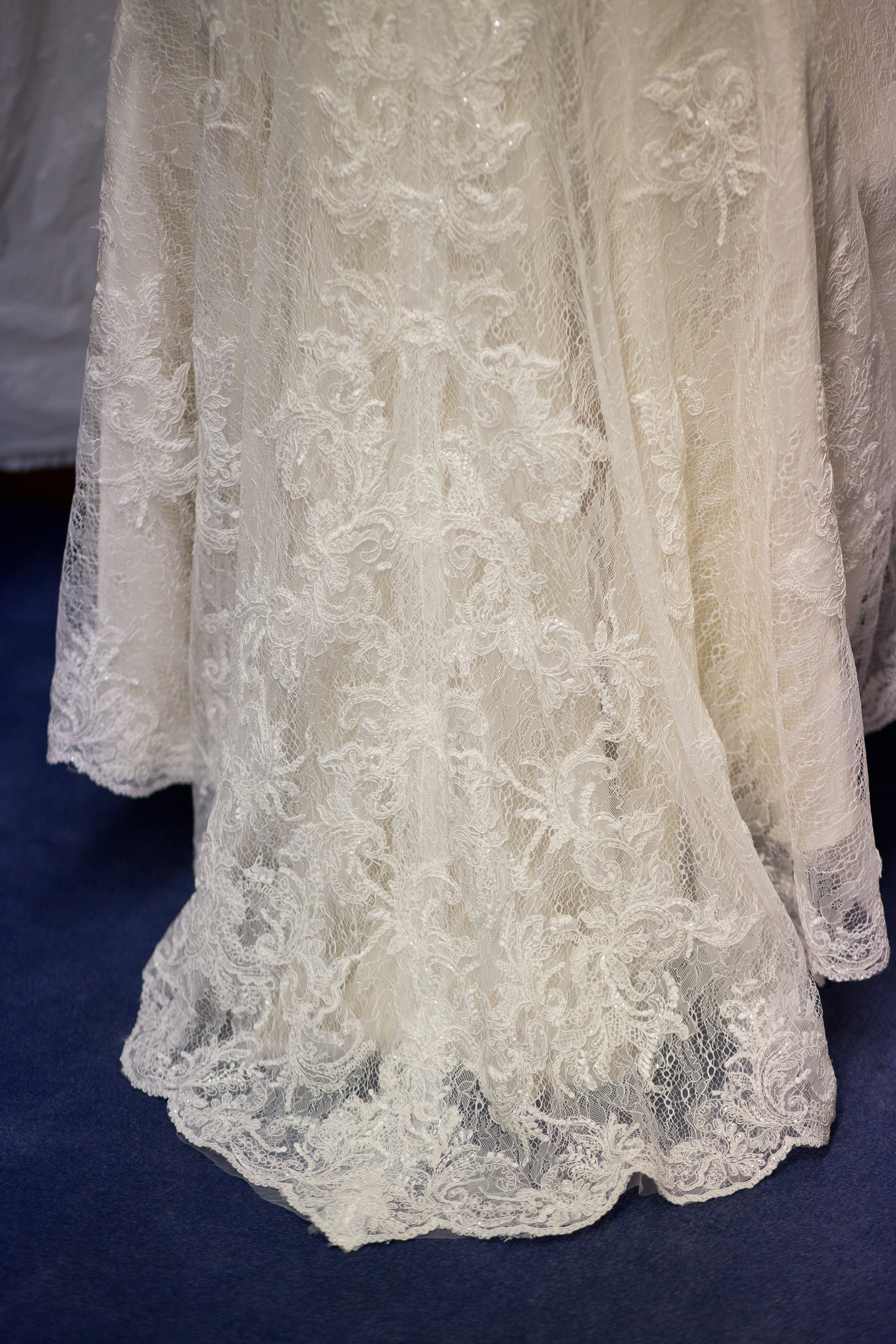Long lace bridal gown for wedding in Colorado Springs at First Baptist Church Stacy Carosa Photography