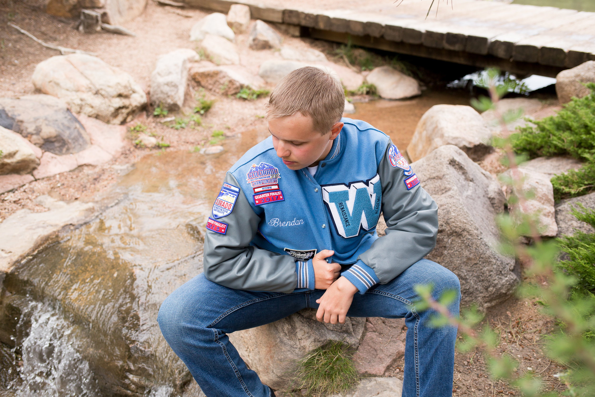 Colorado Springs Senior Photography | Stacy Carosa Photography | Colorado Springs senior photographer | senior session at Fox Run Park | Widefield high school senior varisty jacket band