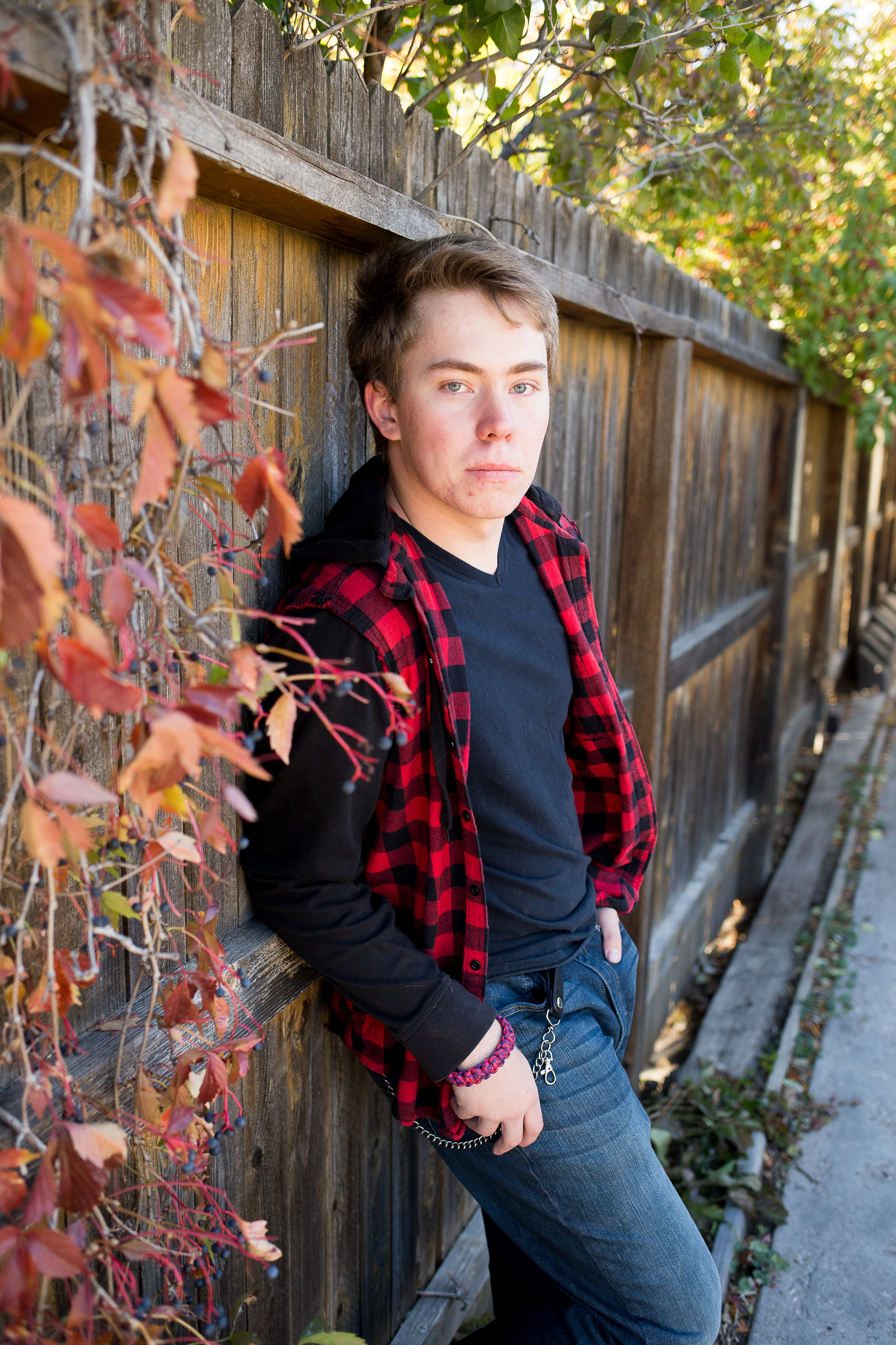 Stacy Carosa Photography | Colorado Springs Senior Photographer | senior boy standing near fall colors for senior session photos