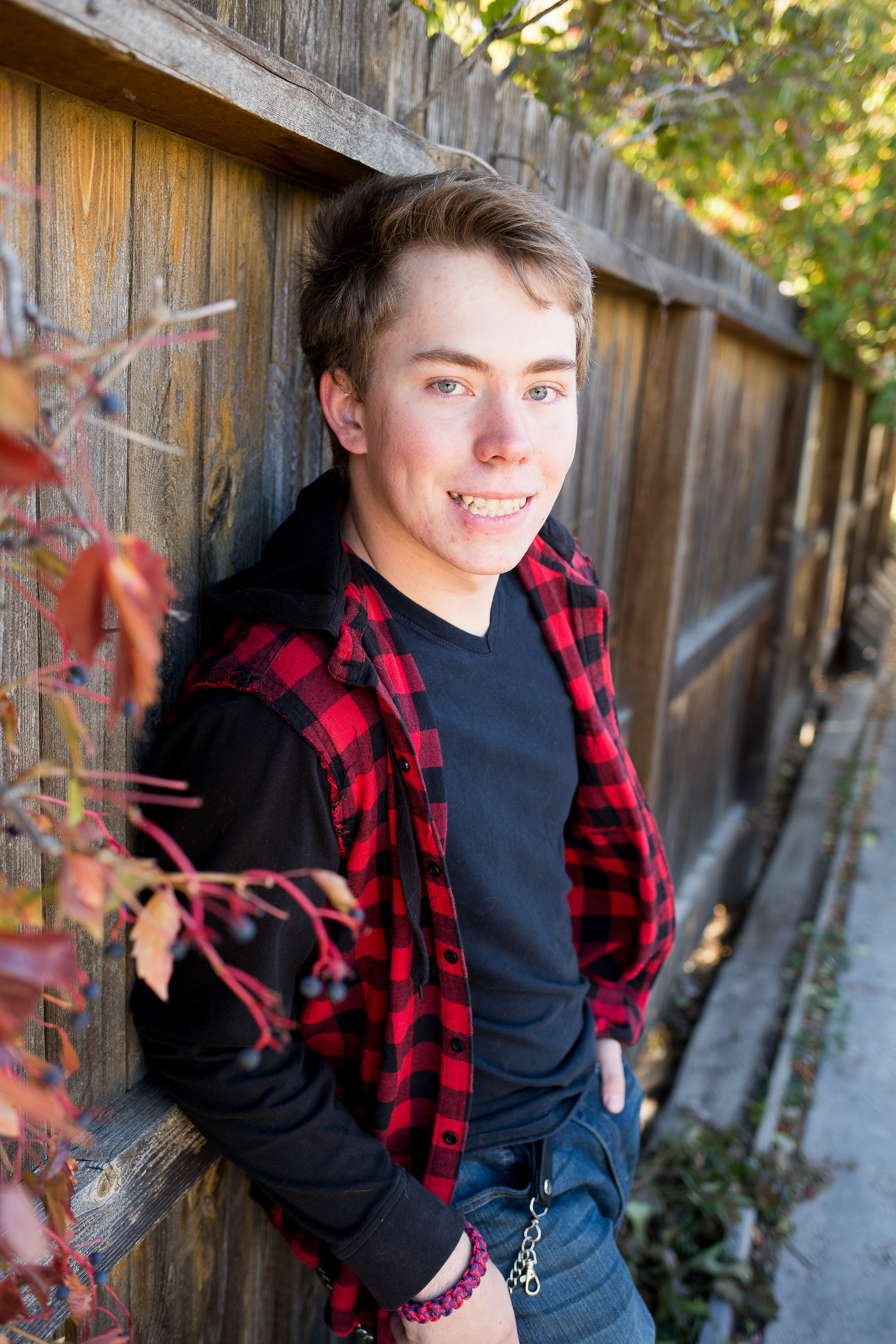 Stacy Carosa Photography | Colorado Springs Senior Photographer | senior boy standing near fall colors for senior session photos
