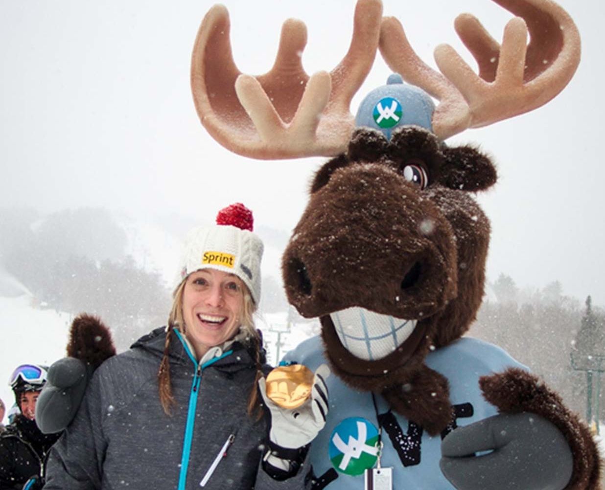 moose mascot with fans